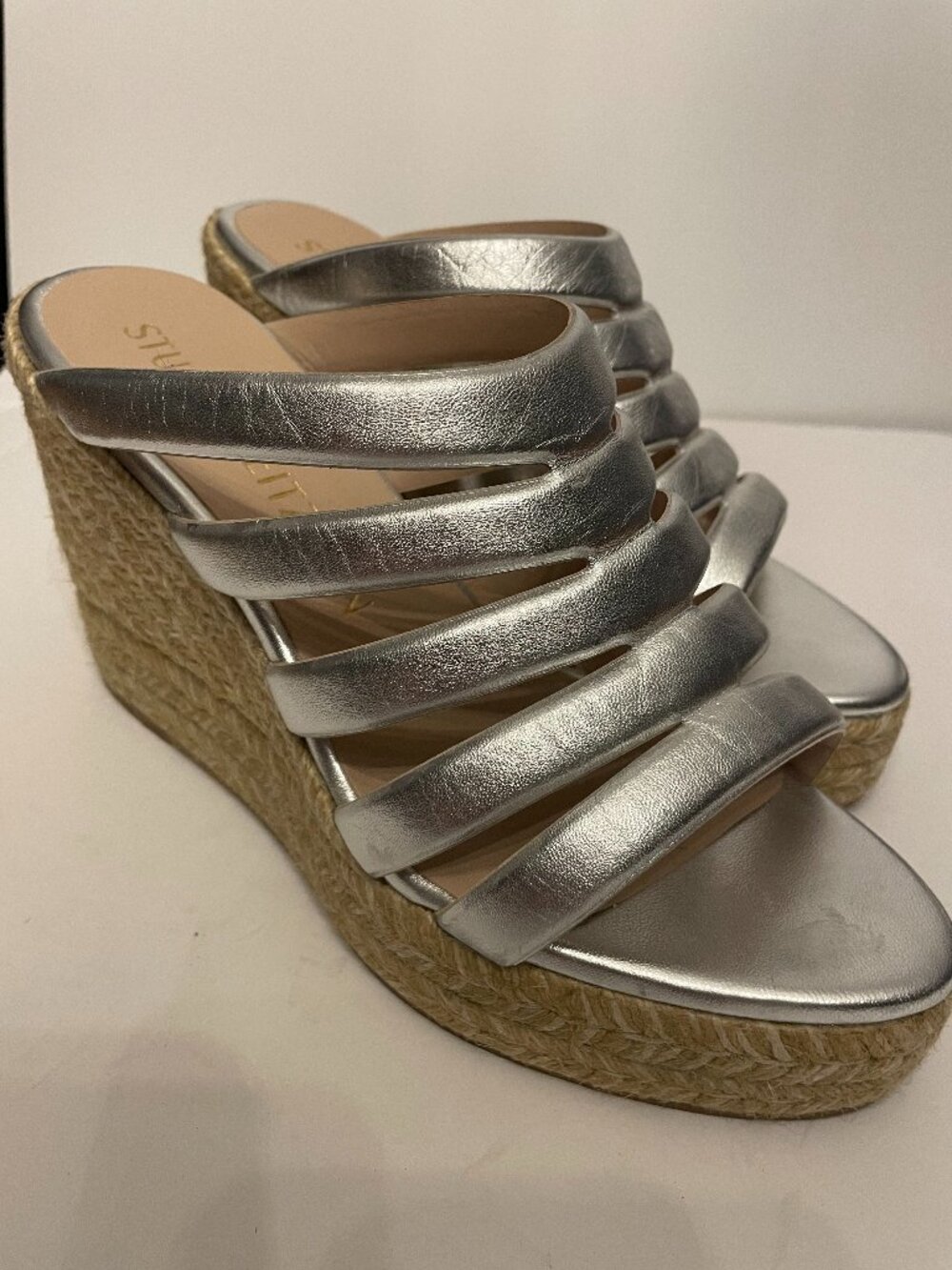 Stuart Weitzman silver slip-on wedge sandals, size 9.5